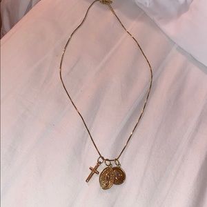 ‘The M Jewelers Multiple Medal Cross Necklace’